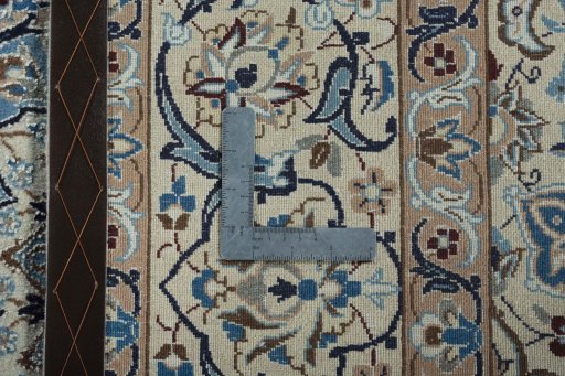 Backside of handmade 2000s Nain rug showing knot structure and weave density