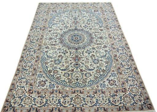 Surface texture of 2000s Nain rug with natural Wool and intricate pattern