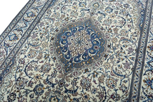 Backside of handmade 2000s Nain rug showing knot structure and weave density
