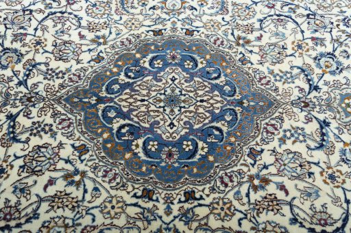 Central medallion detail of 2000s Nain rug from Iran / Persia