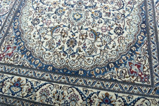 Close-up detail of 2000s Nain rug from Iran / Persia showing Wool weave