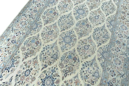 Backside of handmade New Nain rug showing knot structure and weave density