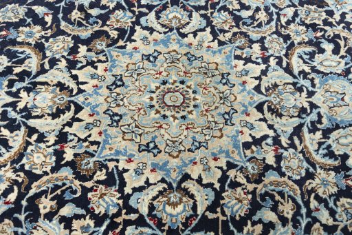 Central medallion detail of 2000s Nain rug from Iran / Persia