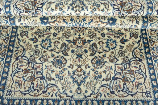 Close-up detail of 2000s Nain rug from Iran / Persia showing Wool weave