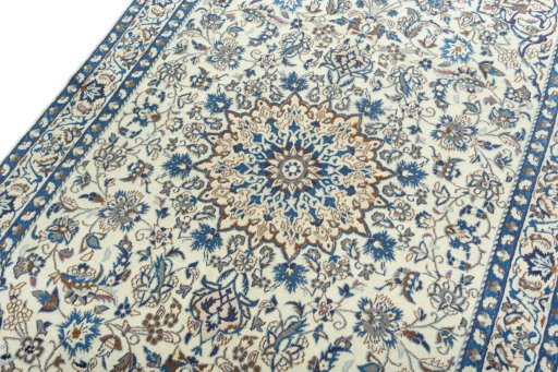 Backside of handmade 2000s Nain rug showing knot structure and weave density