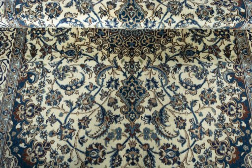 Close-up detail of 2000s Nain rug from Iran / Persia showing Wool weave