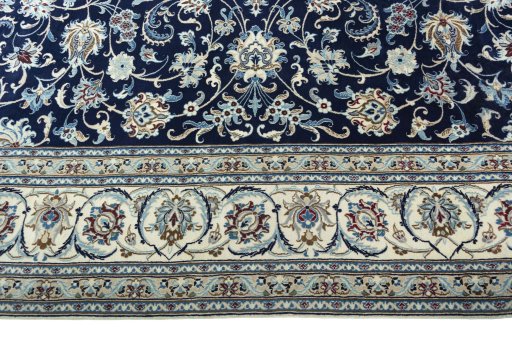 Corner detail of 2000s Nain rug showing border pattern and Wool pile