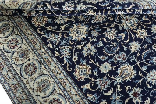 Close-up detail of 2000s Nain rug from Iran / Persia showing Wool weave