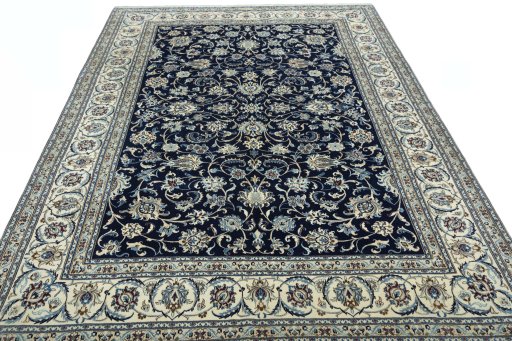 Surface texture of 2000s Nain rug with natural Wool and intricate pattern