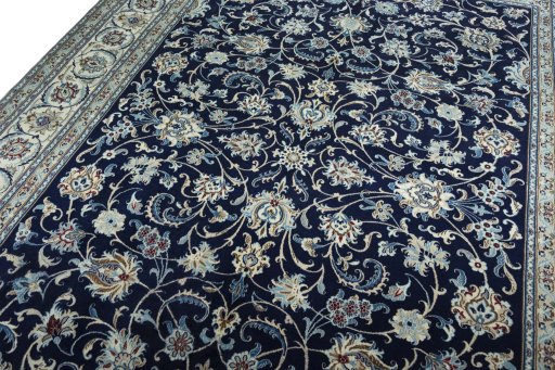 Backside of handmade 2000s Nain rug showing knot structure and weave density