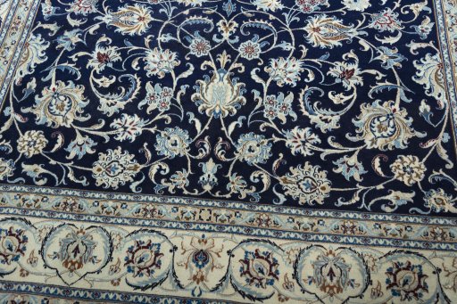 Close-up detail of 2000s Nain rug from Iran / Persia showing Wool weave