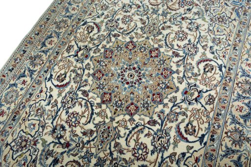Backside of handmade 2000s Nain rug showing knot structure and weave density