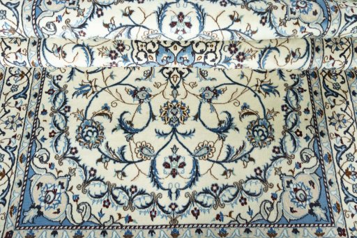 Close-up detail of 2000s Nain rug from Iran / Persia showing Wool weave