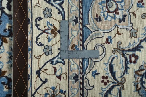 Backside of handmade 2000s Nain rug showing knot structure and weave density