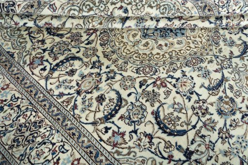 Close-up detail of 2000s Nain rug from Iran / Persia showing Wool weave