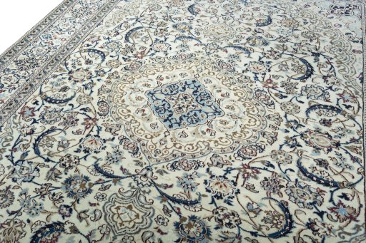 Backside of handmade 2000s Nain rug showing knot structure and weave density