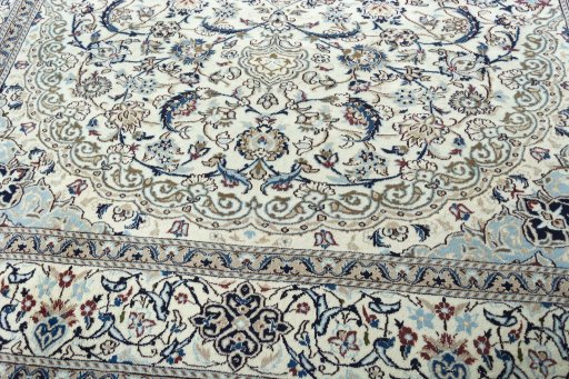 Close-up detail of 2000s Nain rug from Iran / Persia showing Wool weave