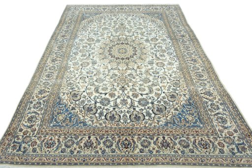 Surface texture of 2000s Nain rug with natural Wool and intricate pattern