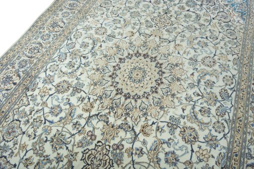Backside of handmade 2000s Nain rug showing knot structure and weave density