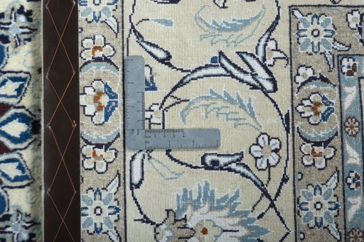 Backside of handmade 2000s Nain rug showing knot structure and weave density