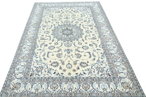 Surface texture of 2000s Nain rug with natural Wool and intricate pattern