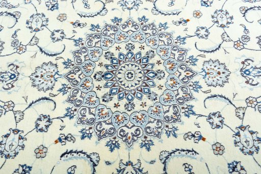 Central medallion detail of 2000s Nain rug from Iran / Persia