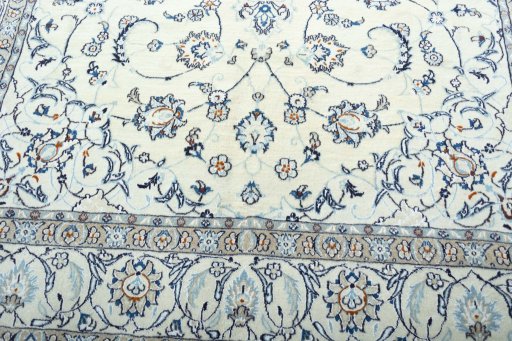 Close-up detail of 2000s Nain rug from Iran / Persia showing Wool weave