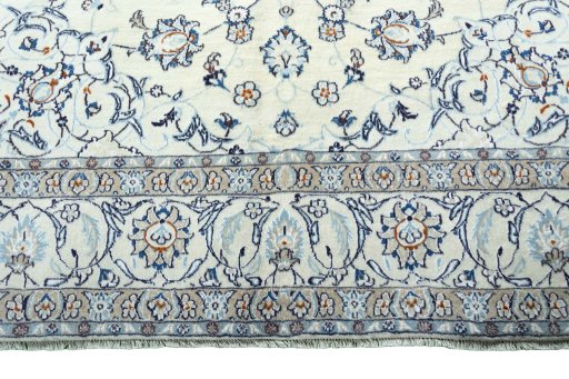 Full view of 2000s Nain rug from Iran / Persia, 295 × 195 cm in Beige tones