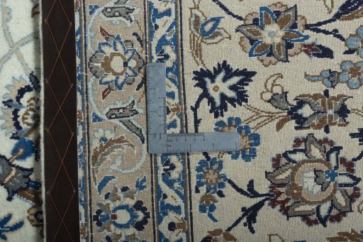 Backside of handmade 2000s Nain rug showing knot structure and weave density