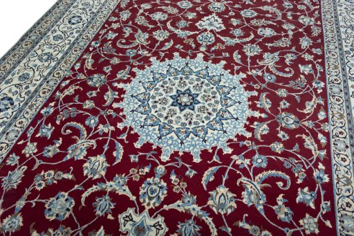 Backside of handmade 2000s Nain rug showing knot structure and weave density