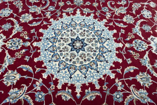 Central medallion detail of 2000s Nain rug from Iran / Persia