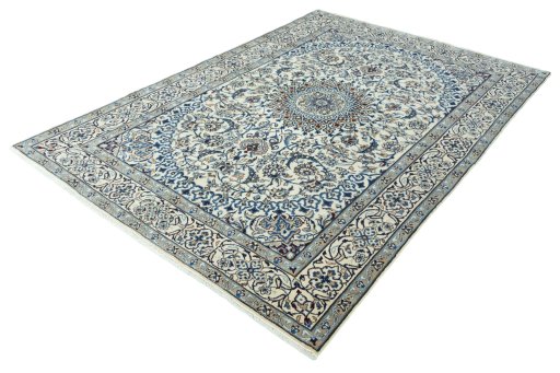 Corner detail of 2000s Nain rug showing border pattern and Wool pile