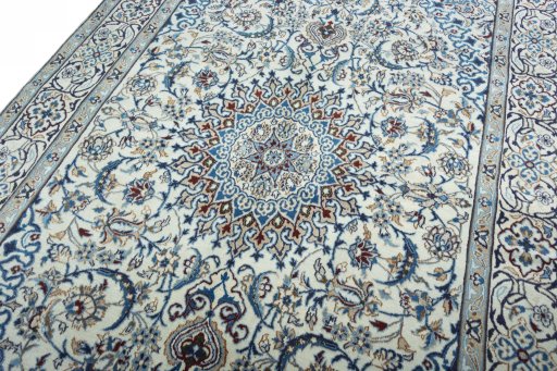 Backside of handmade 2000s Nain rug showing knot structure and weave density