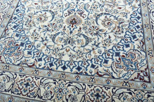 Close-up detail of 2000s Nain rug from Iran / Persia showing Wool weave