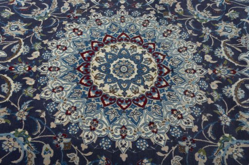 Central medallion detail of 2000s Nain rug from Iran / Persia