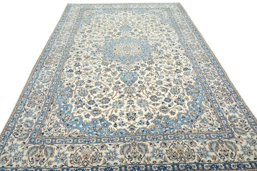 Surface texture of 2000s Nain rug with natural Wool and intricate pattern