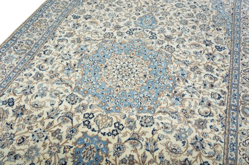 Backside of handmade 2000s Nain rug showing knot structure and weave density