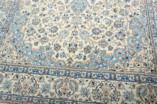 Close-up detail of 2000s Nain rug from Iran / Persia showing Wool weave