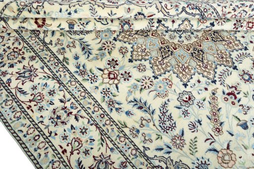 Close-up detail of 2000s Nain rug from Iran / Persia showing Wool weave