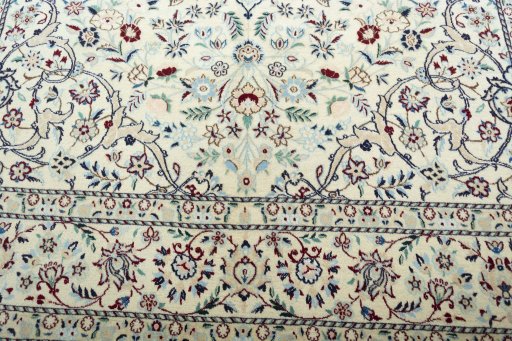 Close-up detail of 2000s Nain rug from Iran / Persia showing Wool weave