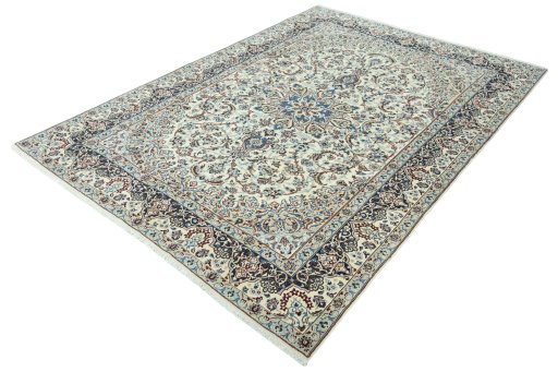Corner detail of 2000s Nain rug showing border pattern and Wool pile