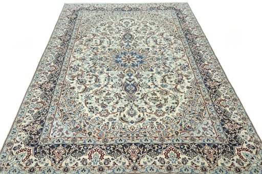Surface texture of 2000s Nain rug with natural Wool and intricate pattern