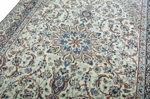 Backside of handmade 2000s Nain rug showing knot structure and weave density