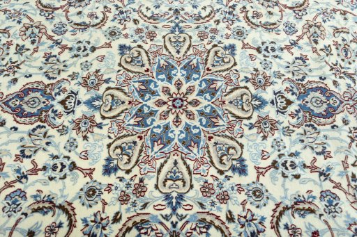 Central medallion detail of 2000s Nain rug from Iran / Persia