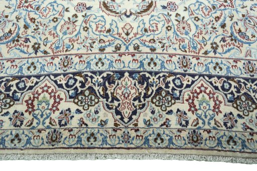 Full view of 2000s Nain rug from Iran / Persia, 305 × 207 cm in Beige tones