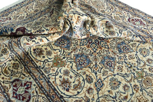 Surface texture of 2000s Nain rug with natural Wool and intricate pattern