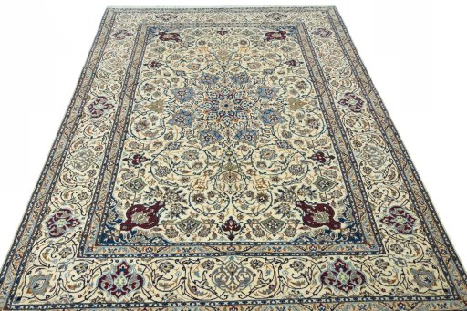 Surface texture of 2000s Nain rug with natural Wool and intricate pattern