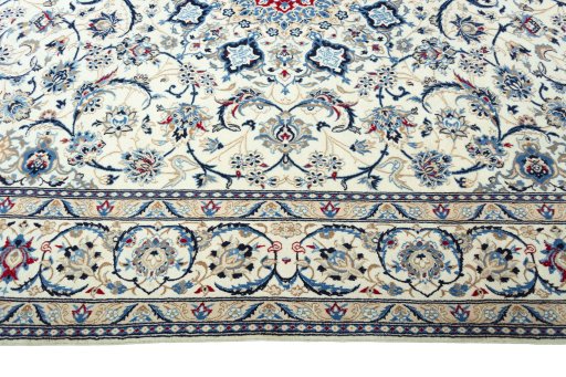 Corner detail of 2000s Nain rug showing border pattern and Wool pile