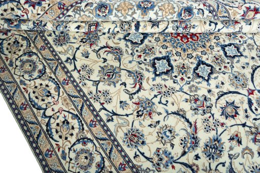 Close-up detail of 2000s Nain rug from Iran / Persia showing Wool weave