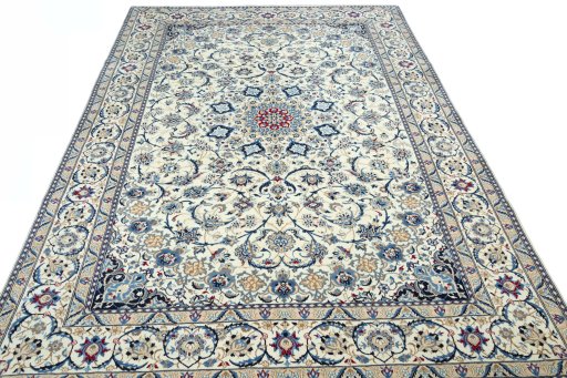 Surface texture of 2000s Nain rug with natural Wool and intricate pattern
